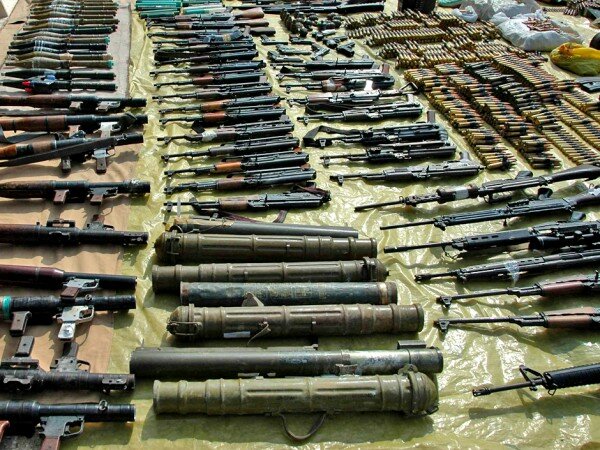A handout photograph released by Syria's national news agency SANA on March 7, 2012, shows weapons found by Syrian security in Homs, that they said belong to armed groups. REUTERS/SANA/Handout (SYRIA - Tags: POLITICS CIVIL UNREST) FOR EDITORIAL USE ONLY. NOT FOR SALE FOR MARKETING OR ADVERTISING CAMPAIGNS. THIS IMAGE HAS BEEN SUPPLIED BY A THIRD PARTY. IT IS DISTRIBUTED, EXACTLY AS RECEIVED BY REUTERS, AS A SERVICE TO CLIENTS