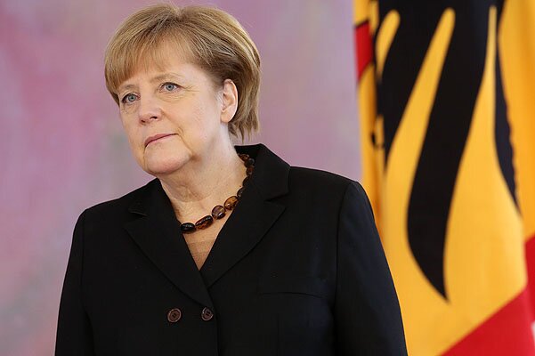 BERLIN, GERMANY - DECEMBER 17: German Chancellor Angela Merkel (CDU) attends a ceremony in which German President Joachim Gauck appointed the new German government cabinet on December 17, 2013 in Berlin, Germany. The new government is a coalition between the German Christian Democrats (CDU), the Bavarian Christian Democrats (CSU) and German Social Democrats (SPD) following federal elections held in September. (Photo by Adam Berry/Getty Images)