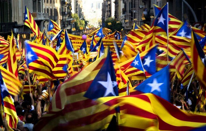 SEPTEMBER 11: Demonstrators wave Catalan flags during a protest rally in Barcelona, Spain. Thousands of people joined a rally demanding independence for Catalonia, in northeastern Spain, on the Catalan national day. (Emilio Morenatti/Associated Press)